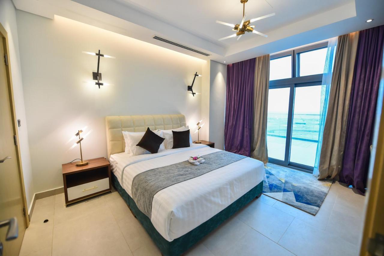 Waterfront Hotel Apartment Lusail Buitenkant foto A bedroom at the hotel