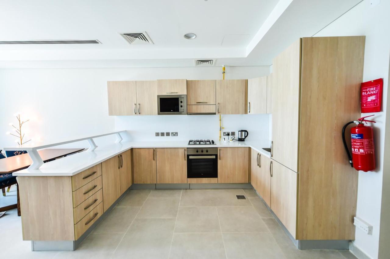 Waterfront Hotel Apartment Lusail Buitenkant foto A typical kitchen in a student residence hall