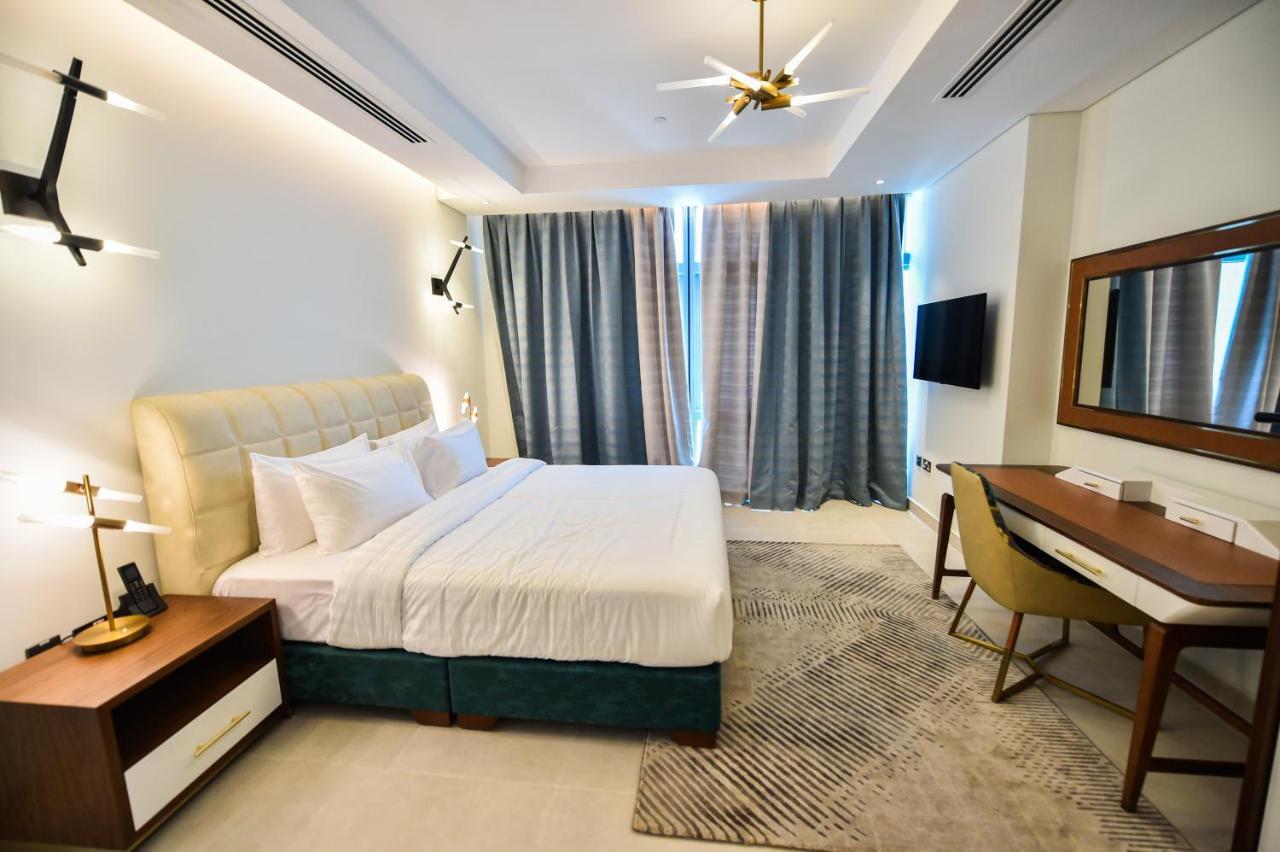 Waterfront Hotel Apartment Lusail Buitenkant foto A bedroom at the hotel