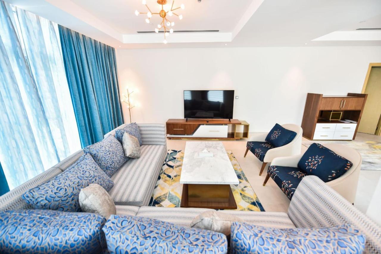 Waterfront Hotel Apartment Lusail Buitenkant foto A living room in a luxury apartment