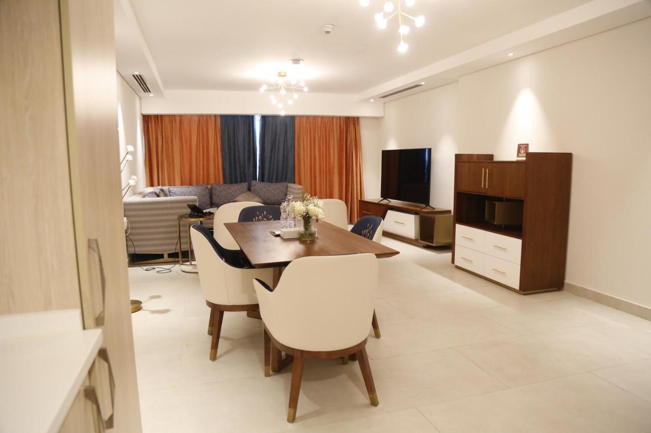Waterfront Hotel Apartment Lusail Buitenkant foto A living room in a typical apartment