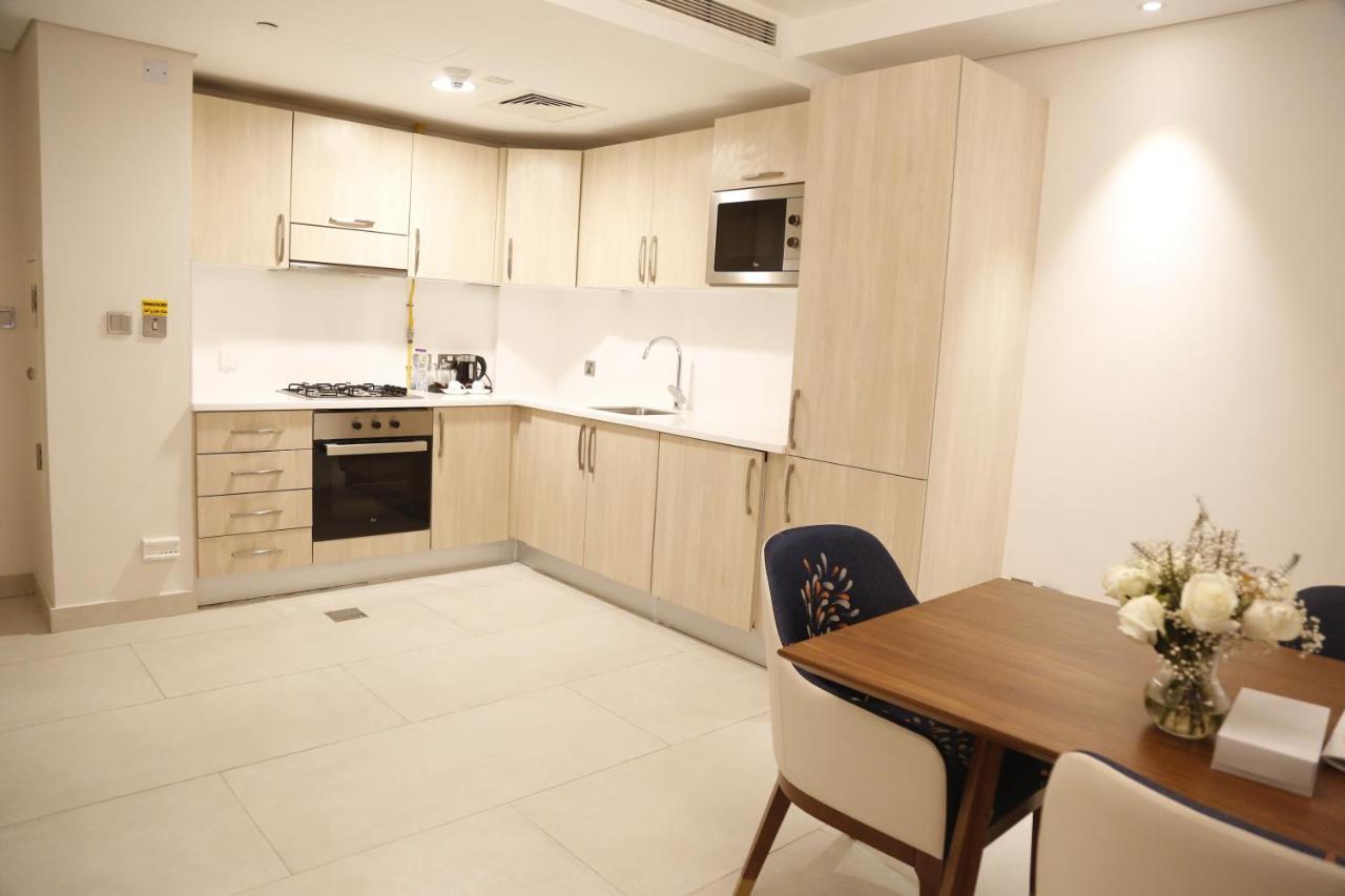 Waterfront Hotel Apartment Lusail Buitenkant foto A kitchen in a serviced apartment in London